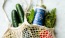 netted bag full of groceries on counter